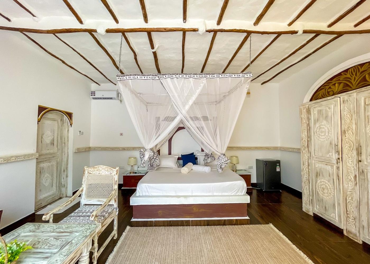 Canopied bed in a resort suite